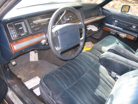 1991 Ford LTD Crown Victoria - Interior view of a 1991 Ford Crown Victoria LTD, highlighting the dashboard and seating.