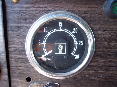 1981 Kenworth W900A - Close-up of a Kenworth tachometer gauge showing RPM.