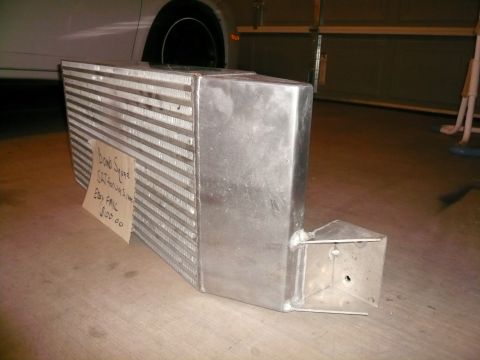 1996 Ford Probe - An aluminum intercooler part is shown with a handwritten tag indicating its origin and price.