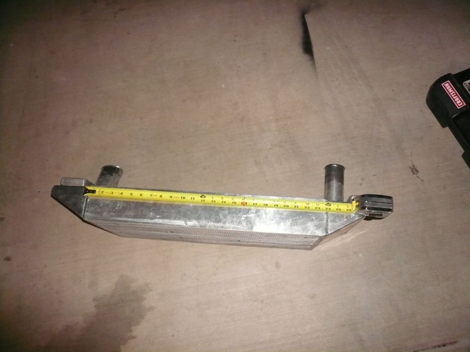 intercooler with tape measure showing length