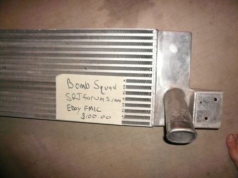 1996 Ford Probe - Intercooler with handwritten tag indicating it is for sale on eBay.