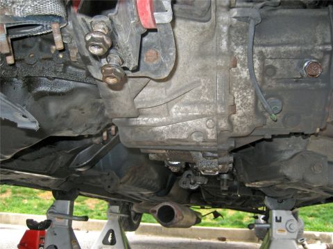 1993 Ford Probe - Underside view of a 1993 Ford Probe, highlighting the transmission and exhaust components.
