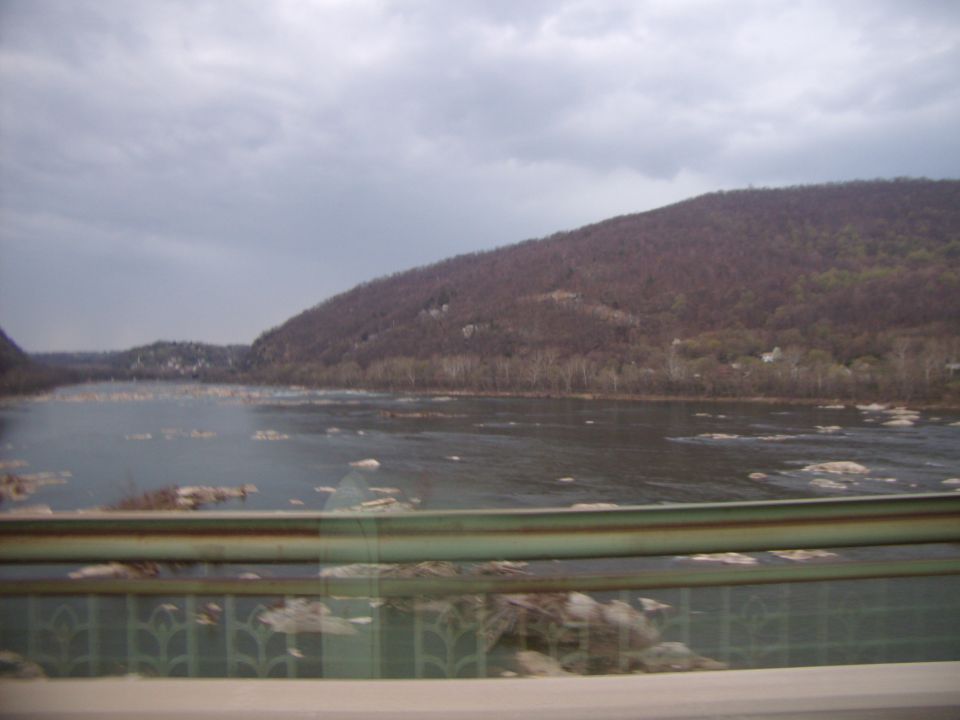 River and mountain landscape under cloudy sky
