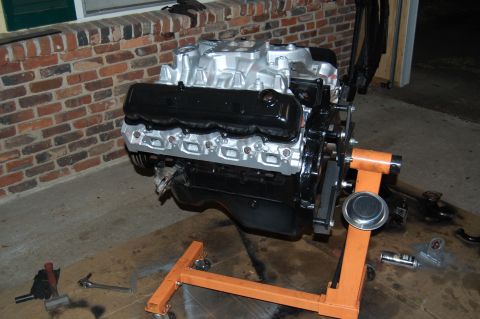 1994 Ford Bronco - Engine on an orange engine stand, ready for installation or rebuild.