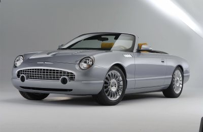 2004 Ford Thunderbird - This silver 2004 Ford Thunderbird convertible features a distinctive grille and round headlights.