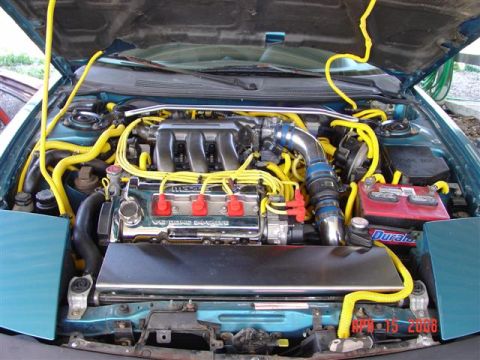 1993 Ford Probe - The engine bay features a V6 DOHC valve cover and numerous yellow hoses, with a watermark indicating April 15, 2008.