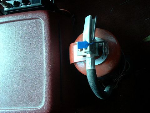 1994 Ford Bronco - This is the front fire extinguisher. Within easy reach.