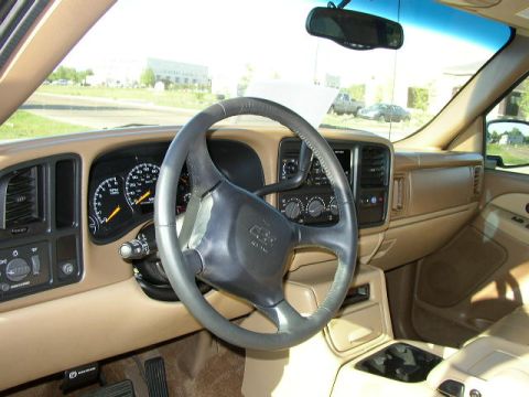 1995 Ford Bronco - Interior view of a Chevrolet truck, showing the dashboard, steering wheel, and center console.