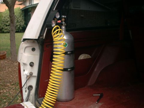 1994 Ford Bronco - A 15lb CO2 tank with adjustable regultor. I found the different parts on Ebay and only spent aobut 110 bucks. Much better that 300+ for a P…