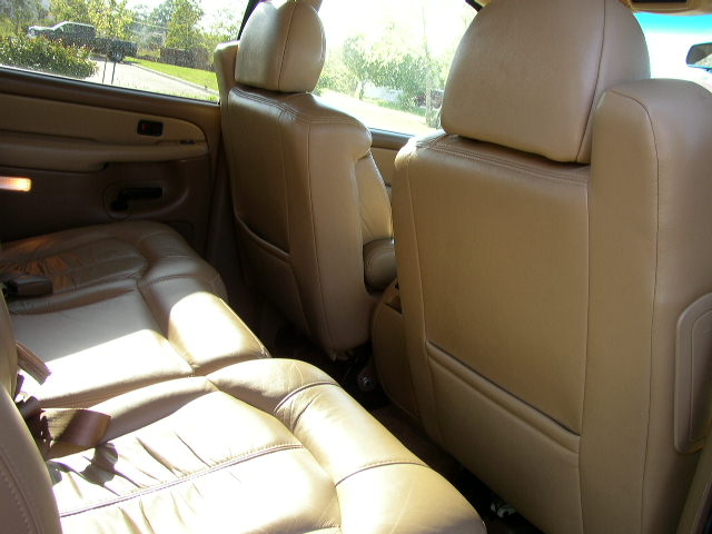 Tan leather seats and door panel inside a 2000 Chevrolet Suburban