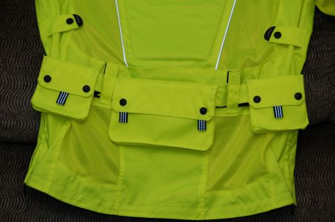 1998 BMW R1100GS ABS - This lime green motorcycle jacket features multiple cargo pockets and reflective trim for visibility.