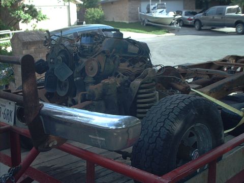1994 Ford Bronco - Sitting pretty ont he trailer. 360 motor, NP manual tranny, NP205 T-case, a high pinion Dana 44 front, and a 9 inch rear. Not bad for $120.
