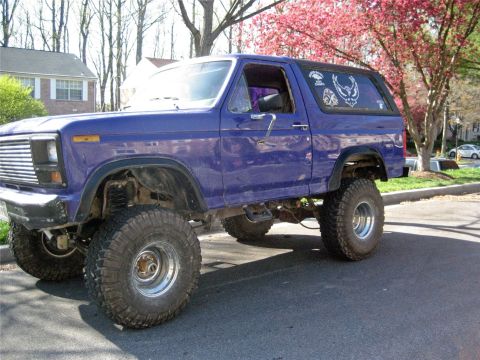 1993 Ford Probe - This lifted 1980 Ford Bronco features large off-road tires and a custom paint job.