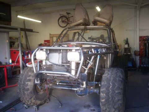 1982 Toyota 4Runner - This custom off-road buggy features a prominent roll cage and oversized tires, suggesting significant modifications from its original form.