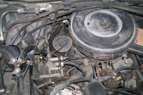 1992 Ford C-350 (Centurion Conversions) - Close-up view of an engine bay, showing various mechanical parts and wiring. Supermotors.net watermark is visible.