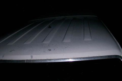 1992 Ford C-350 (Centurion Conversions) - Close-up of a vehicle's roof section with distinctive raised ribs.