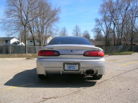 1994 Mazda MX-6 - Rear view of a silver 1994 Mazda MX-6 parked in a lot.