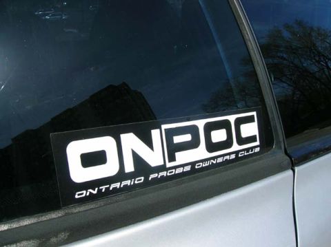 1994 Mazda MX-6 - Sticker on the side window of a car reads "ONPOC ONTARIO PROBE OWNERS CLUB".