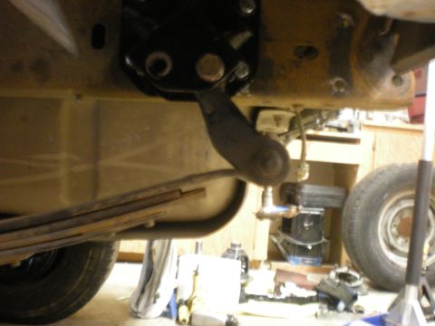 1993 Ford Bronco - Undercarriage view of a 1993 Ford Bronco, showing leaf springs, fuel tank, and suspension components.