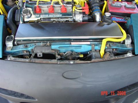 1993 Ford Probe - Close-up view of a car's engine bay, showing the V6 engine and various components.