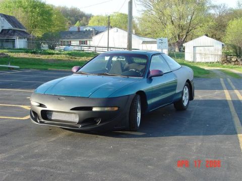 1993 Ford Probe - This 1993 Ford Probe is seen with primer applied to its rear passenger side quarter panel.