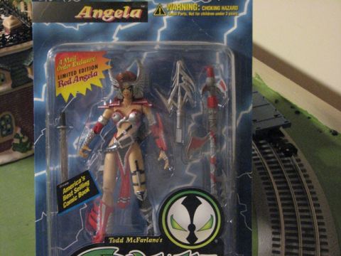 1991 Ford Bronco - Action figure of Angela, a limited edition Red Angela, in its original packaging.