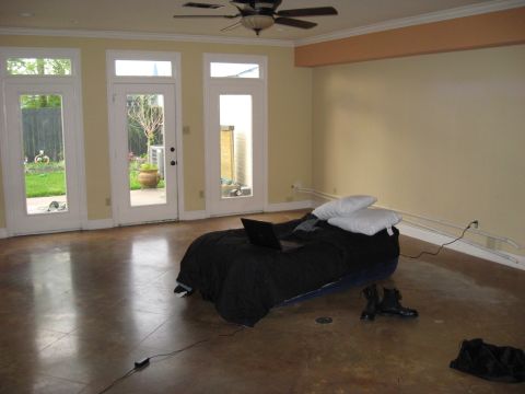 2006 Ford F-150 - A room with a bed and laptop, glass doors that open to a backyard area.