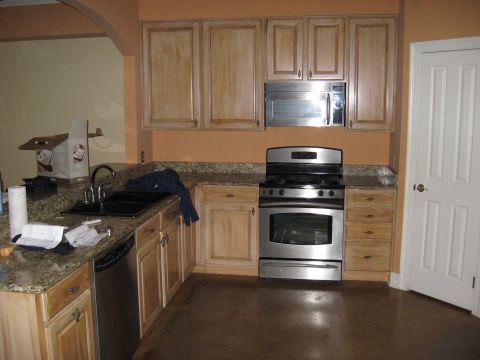 2006 Ford F-150 - A view of a kitchen light wood cabinets, granite countertops, and stainless steel appliances.