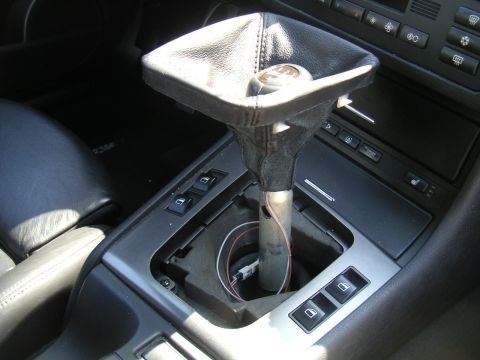 2002 BMW M3 - Interior view of a BMW E46 gear shifter assembly with the boot removed.
