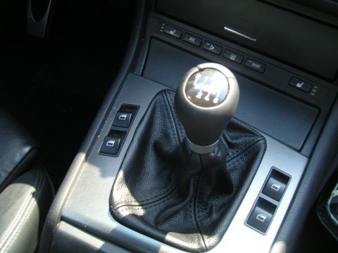 2002 BMW M3 - Interior view of the manual transmission shift knob and boot in a 2002 BMW M3.