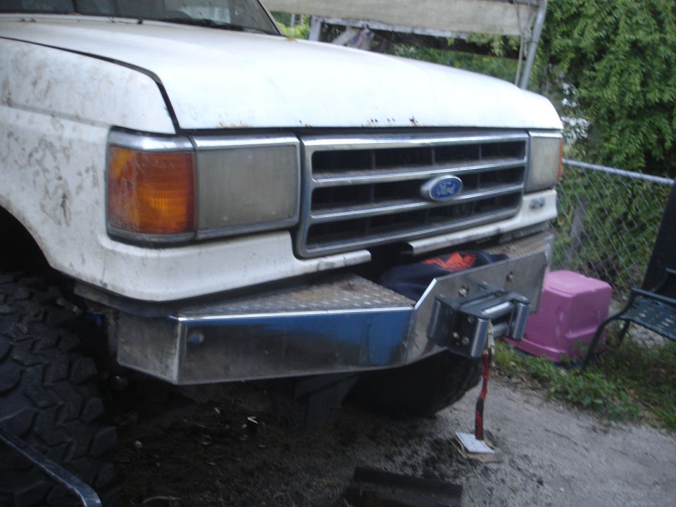 1987 Ford F-Series truck front end with aftermarket winch bumper installed