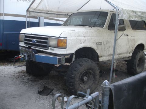1989 Ford Bronco - This 1989 Ford Bronco is equipped with large tires and a winch for off-road use.
