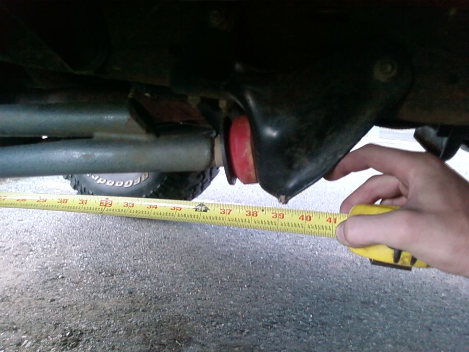 Measuring suspension component with tape measure