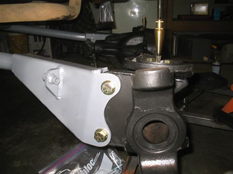 1979 Ford Bronco - This image shows a close-up of a vehicle's suspension system, focusing on mechanical parts and hardware.