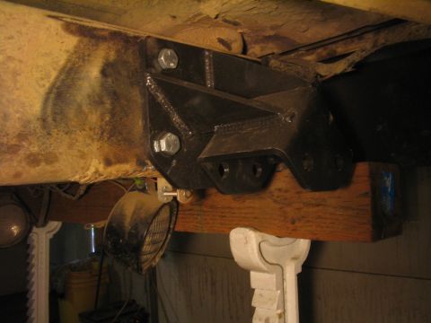 1979 Ford Bronco - Custom suspension bracket installation on a vehicle frame.