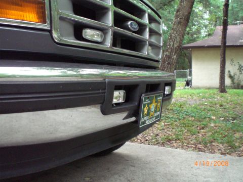 1996 Ford Bronco - Close-up of the front grille and bumper of a 1996 Ford Bronco, a Florida Sheriff Association license plate.