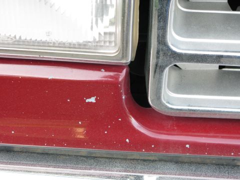 1991 Ford F-150 - Close-up of the front grille and headlight assembly on a 1991 Ford F-150.