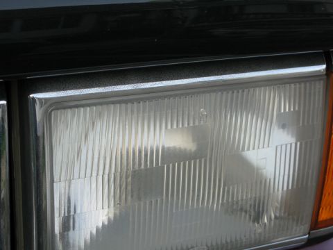 1991 Ford F-150 - Headlight assembly detail, showing the textured lens and surrounding trim.