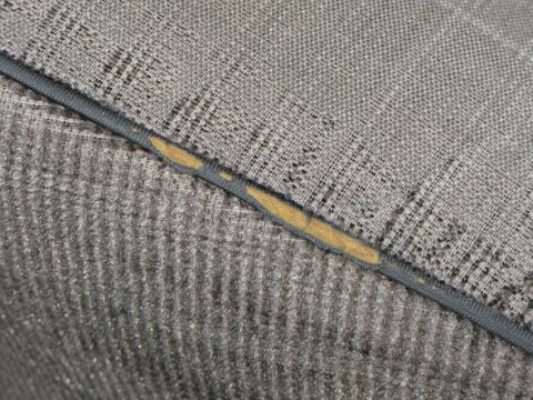 1991 Ford F-150 - The fabric on this seat is worn and torn, revealing the padding beneath. A Supermotors.net logo is visible.