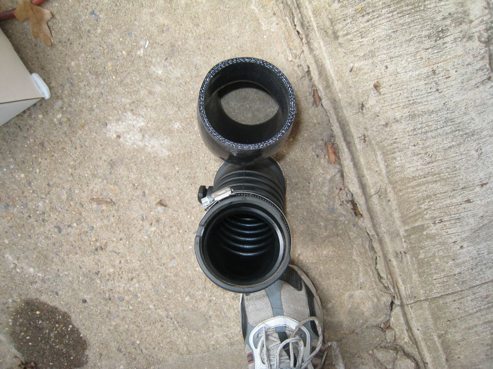 MAF tube and radiator panel parts on concrete