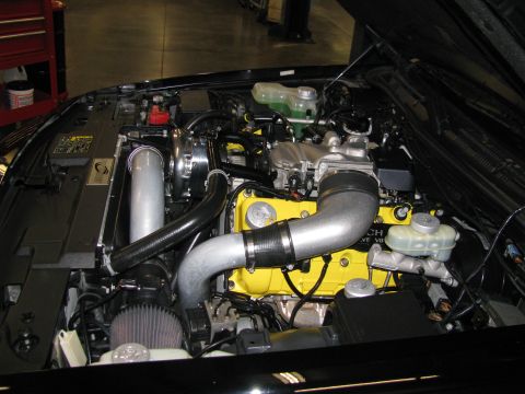 2003 Mercury Marauder - Engine bay with a supercharger and custom intake piping is visible.