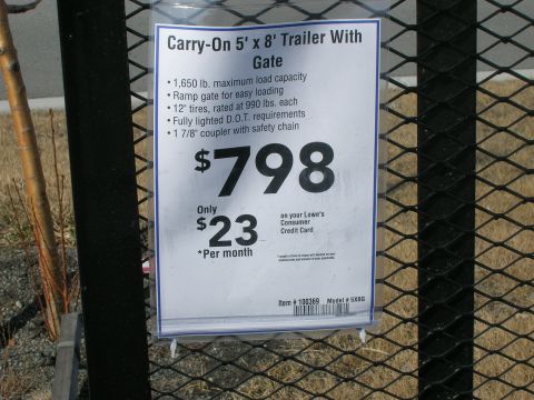 2003 Jeep TJ - Price tag details a Carry-On 5' x 8' trailer with gate, listing its capacity and financing options.