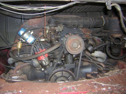 1971 Volkswagen Vanagon - Close-up view of the engine compartment, showing various mechanical components and wiring.