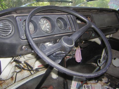 1971 Volkswagen Vanagon - The interior of a 1971 Volkswagen Vanagon shows the dashboard, steering wheel, and gauges.