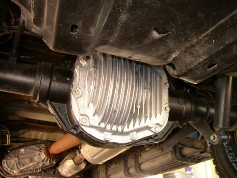 1995 Ford Bronco - Underside view shows the rear differential and drivetrain components of a vehicle.