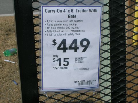 2003 Jeep TJ - A price tag details the features and cost of a trailer, including financing options.