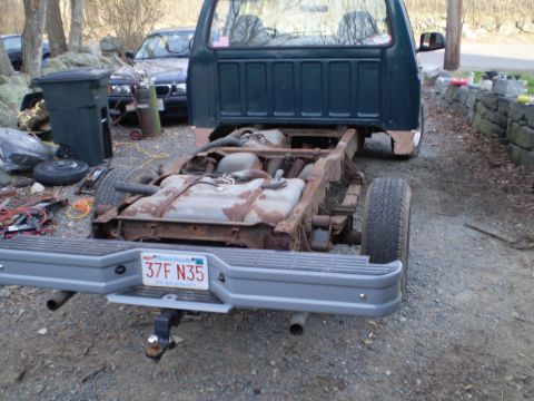 1995 Ford F-150 - Rear view of a 1995 Ford F-150 chassis, showing the fuel tank and suspension components.