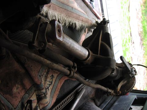 1986 Ford Bronco - Underside view of a vehicle's rear axle assembly and leaf springs.