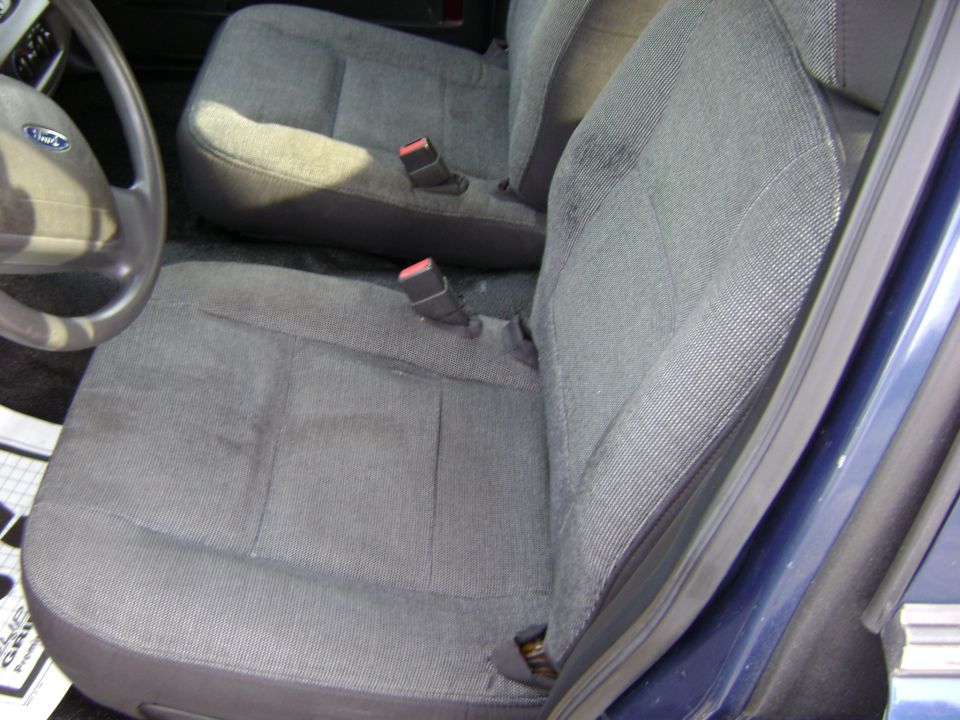 Gray fabric interior seats with visible seatbelts