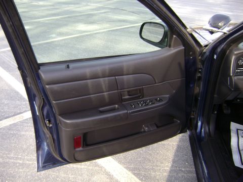 2001 Ford Crown Victoria - Interior view of a 2001 Ford Crown Victoria driver's door panel.